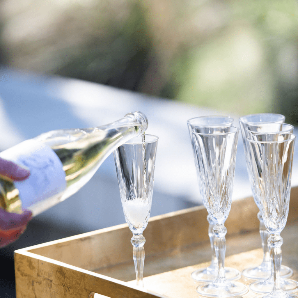 Champagne being poured for guests during a Melbourne Zoo wedding celebration